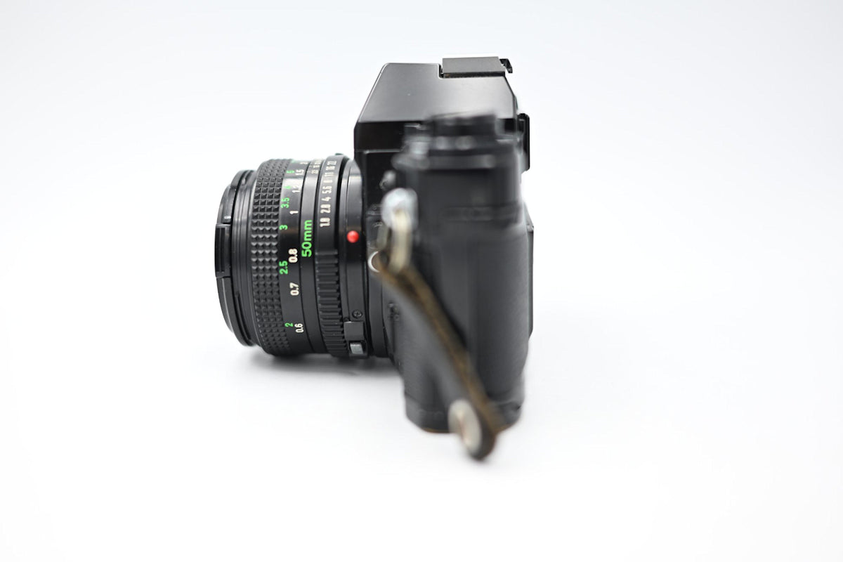 Used Canon AE-1 w/ Canon FD 50mm 1:1.8 Lens