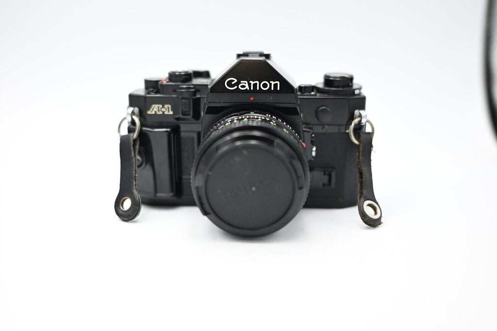 Used Canon AE-1 w/ Canon FD 50mm 1:1.8 Lens
