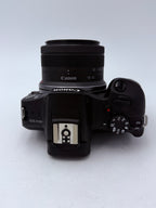 Used Canon R100 w/ RF-S 18-45mm f/4.5-6.3 IS STM Kit Lens