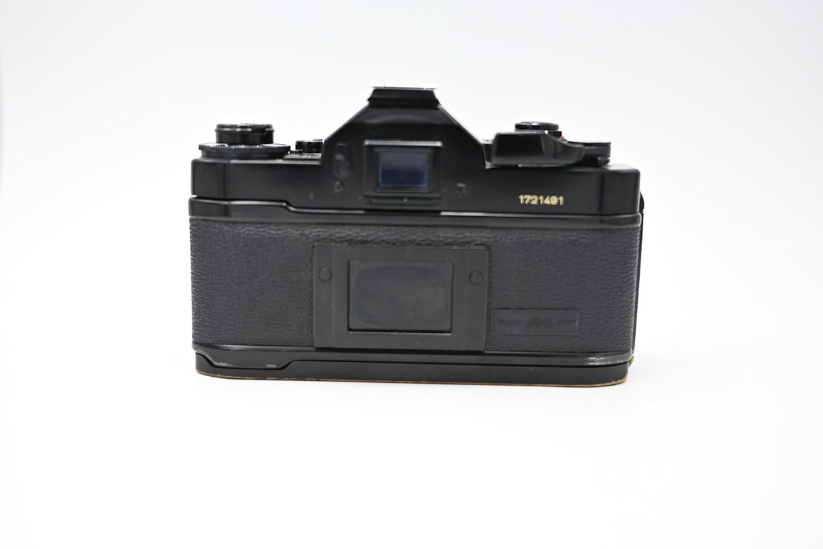 Used Canon AE-1 w/ Canon FD 50mm 1:1.8 Lens