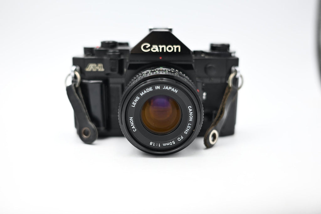 Used Canon AE-1 w/ Canon FD 50mm 1:1.8 Lens