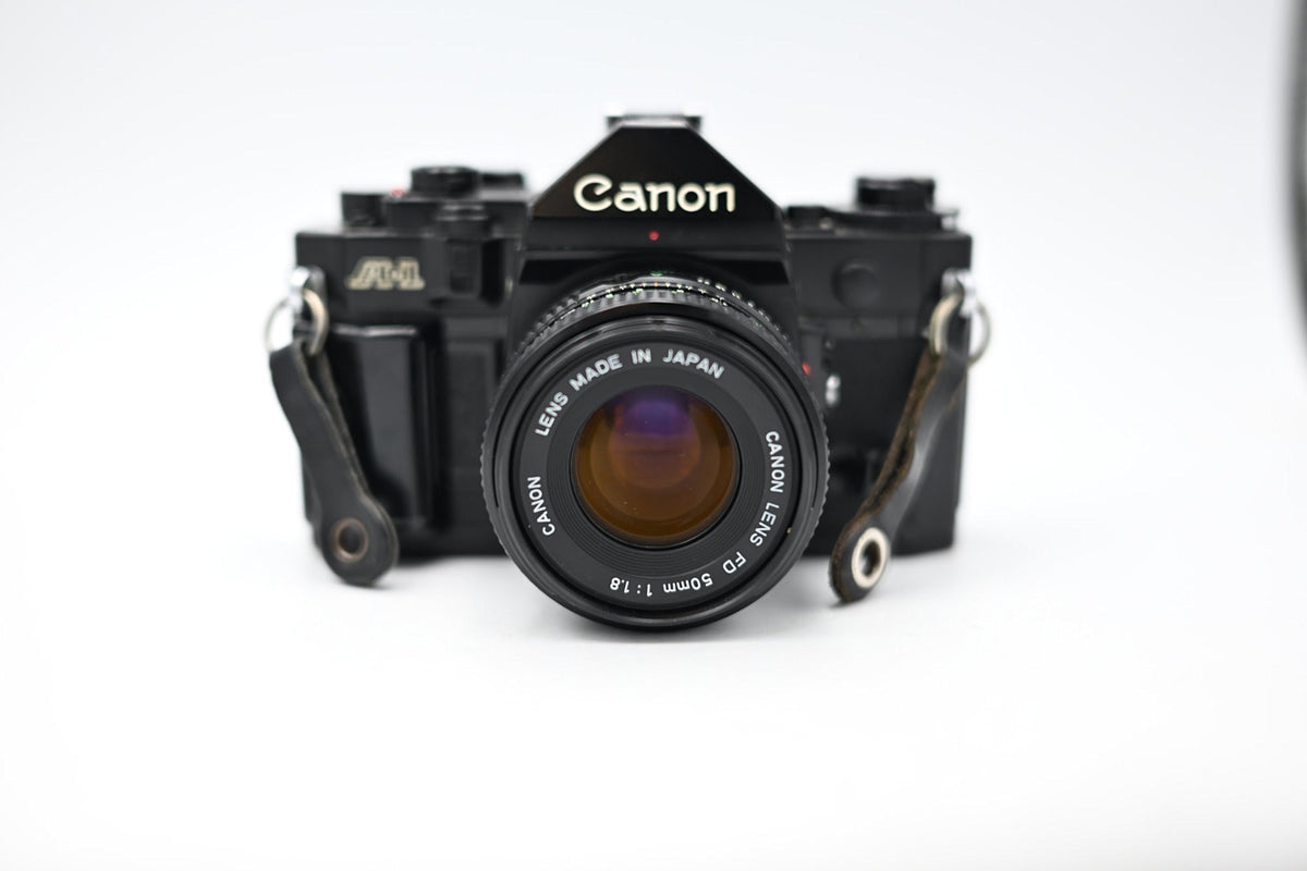 Used Canon AE-1 w/ Canon FD 50mm 1:1.8 Lens